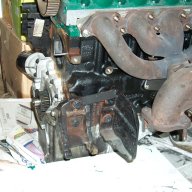 Overhung alternator bracket